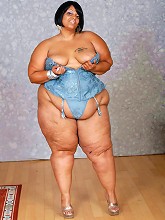 Huge black SuperBBW has her...